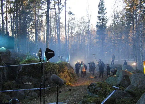 Production work in a smoke-filled forest location