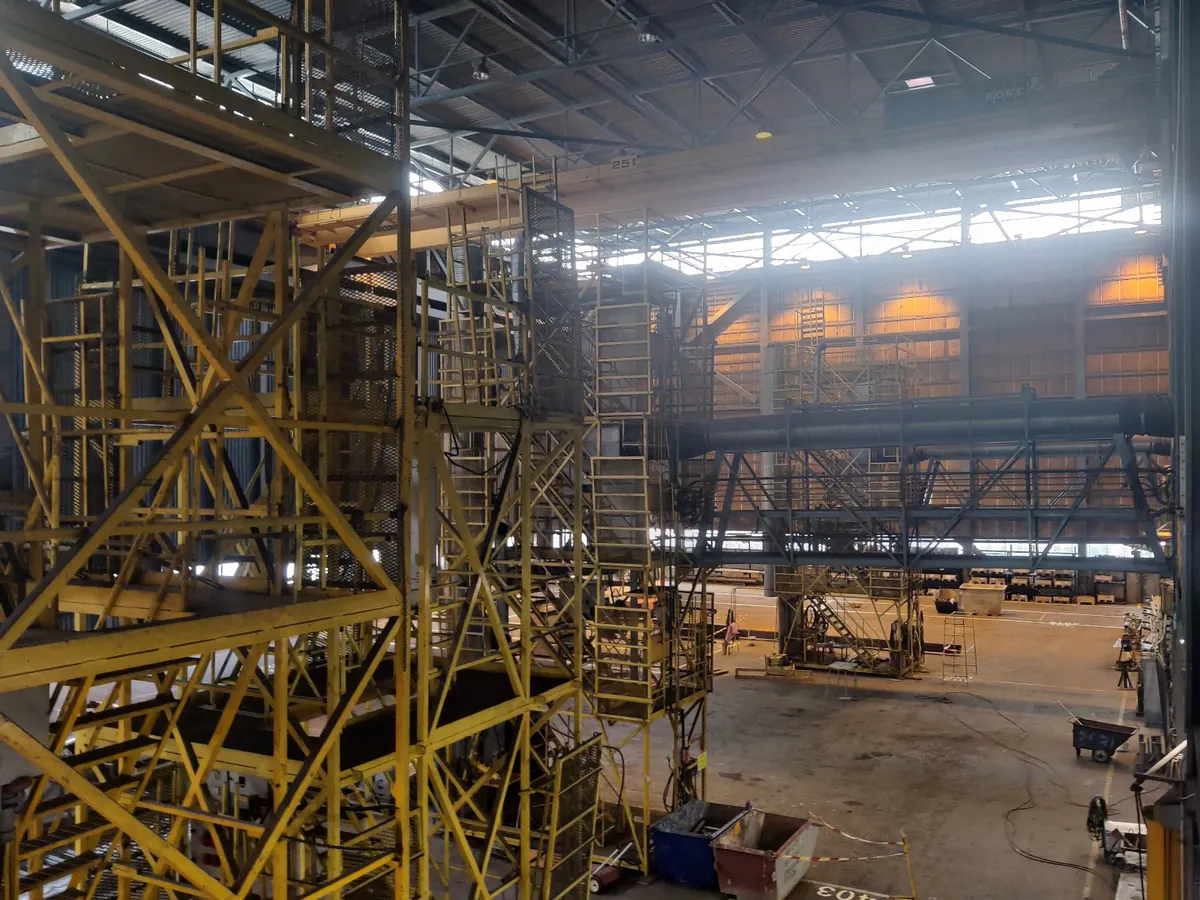 Large industrial interior prepared for production